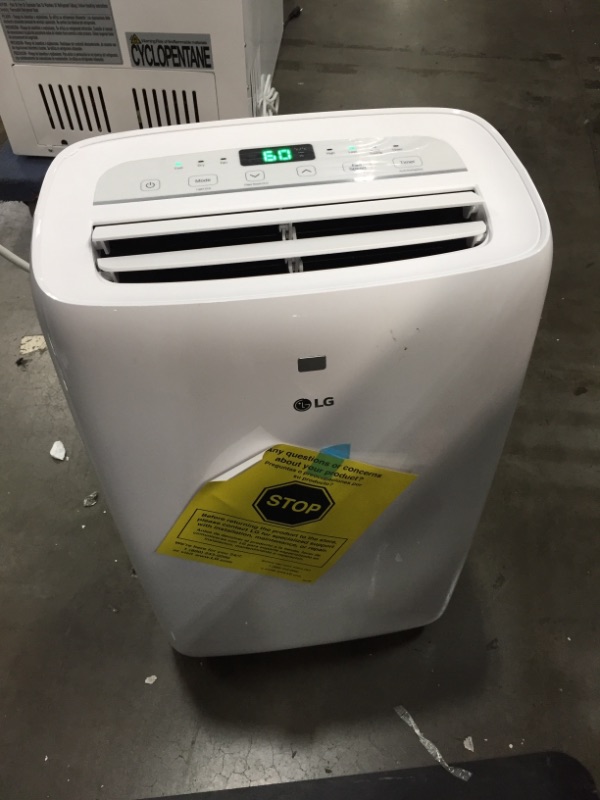 Photo 2 of LG 7,000 BTU (DOE) / 10,000 BTU (ASHRAE) Portable Air Conditioner, Cools 300 Sq.Ft. (12' x 25' room size), Quiet Operation, LCD Remote, Window Installation Kit Included, 115V
