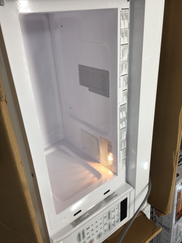 Photo 4 of GE 1.6 cu. ft. Over the Range Microwave in White