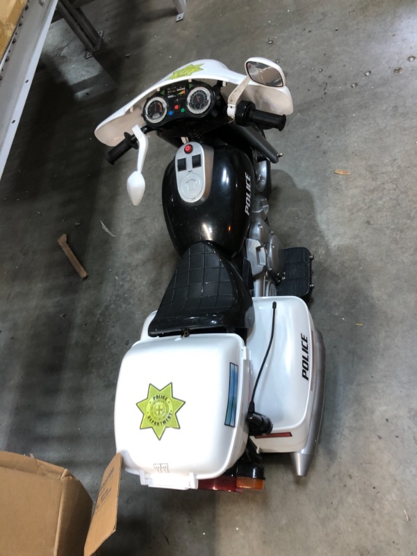 Photo 2 of *HEAVILY USED AND DAMAGED*Kid Motorz 12V Police Motorcycle Powered Ride-On - White
