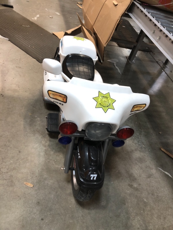 Photo 3 of *HEAVILY USED AND DAMAGED*Kid Motorz 12V Police Motorcycle Powered Ride-On - White
