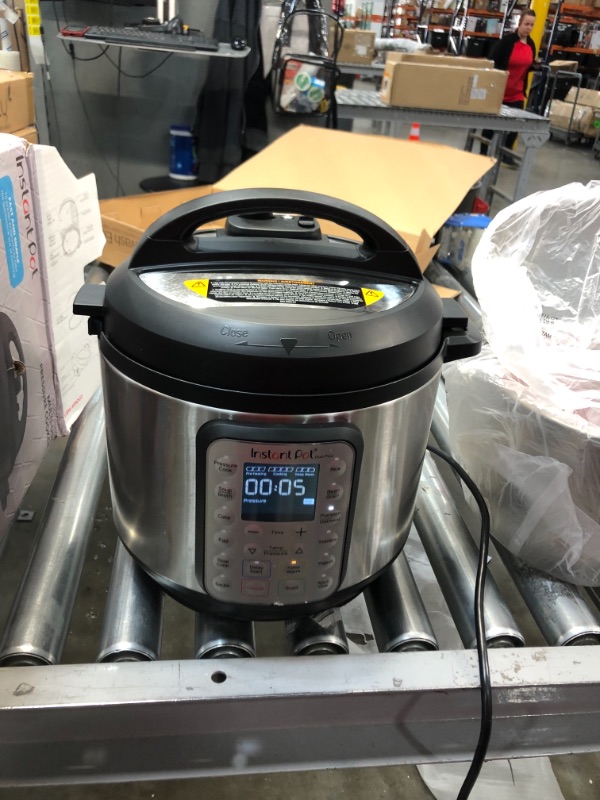 Photo 2 of LID IS DAMAGED 
Instant Pot Duo Plus 6 qt 9-in-1 Slow Cooker/Pressure Cooker