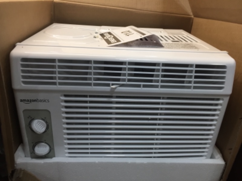 Photo 2 of Amazon Basics Window-Mounted Air Conditioner with Mechanical Control - Cools 150 Square Feet, 5000 BTU, AC Unit
SERIAL NUMBER: 340C3489301140802S0437
