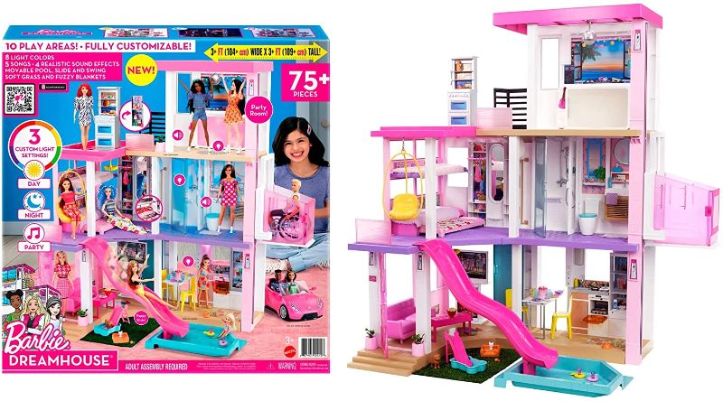 Photo 1 of Barbie Dreamhouse (3.75-ft) 3-Story Dollhouse Playset with Pool & Slide, Party Room, Elevator, Puppy Play Area, Customizable Lights & Sounds, 75+ Pieces, Gift for 3 to 7 Year Olds, New for 2021
