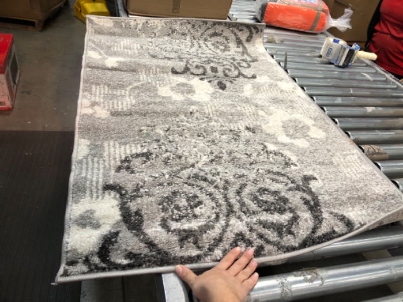 Photo 1 of 2'7"x4' grey rug 