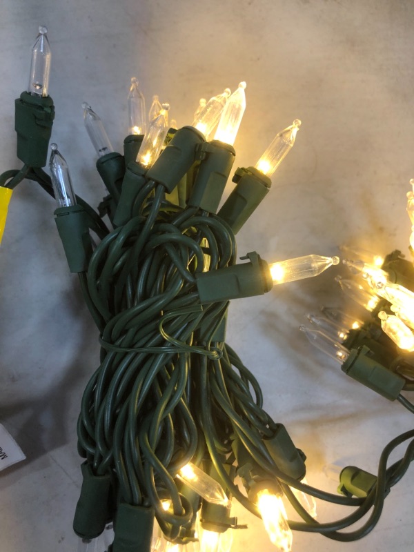 Photo 3 of 12pack/29.5 Ft. 100-Light LED Mini Warm White String Light with Green Wire Christmas Decoration
