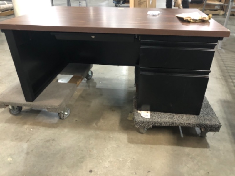 Photo 4 of **DESK IS MISSING LEGS, MISSING KEYS** DAMAGE TO CORNERS**
 Steel Teachers Desk 48x30 - Mahogany Top with Black Frame