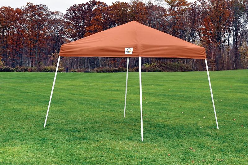 Photo 1 of **ACTUAL CANOPY IS BEIGE**
Slant Leg Pop-Up Canopy with Roller Bag, 
