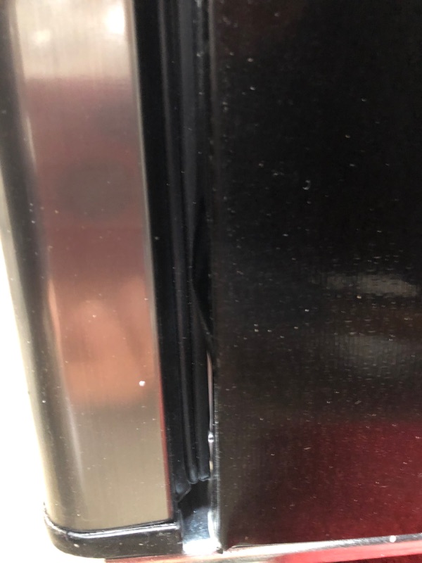 Photo 6 of **FRIDGE HAS MINOR DENTS ON CORNNERS, BOTTOM FRIDGE DOOR IS DIFFICULT TO OPEN **
Danby DFF070B1BSLDB-6 7.0 Cu.Ft. Mid-Size Refrigerator, Frost-Free Apartment Fridge with Top Freezer, E-Star Rated, 7, Black Stainless Look
