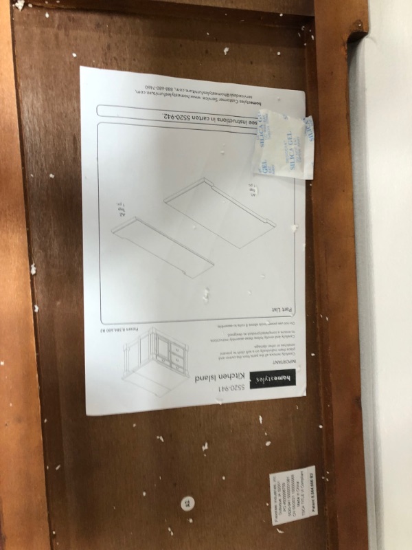 Photo 3 of **ITEM IS NOT COMPLETE, BOX 1 OF 3 ONLY***
 BOX 2 OF 3 BOX 3 OF 3 MISSING**
homestyles Americana Kitchen Island with Wood Top and Drop Leaf Breakfast Bar, Storage with Drawers and Adjustable Shelves, 50 Inch Width, Black and Oak
