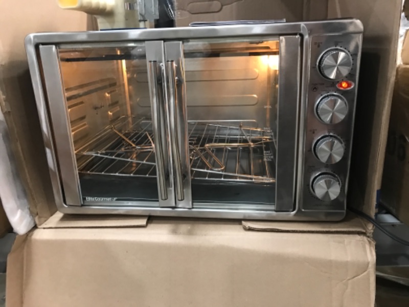 Photo 4 of **OVEN IS USED AND DAMAGED, MAKES LOUD NOISE WHEN POWERED ON**
Elite Gourment ETO-4510M Double Door Oven with Rotisserie and Convection
