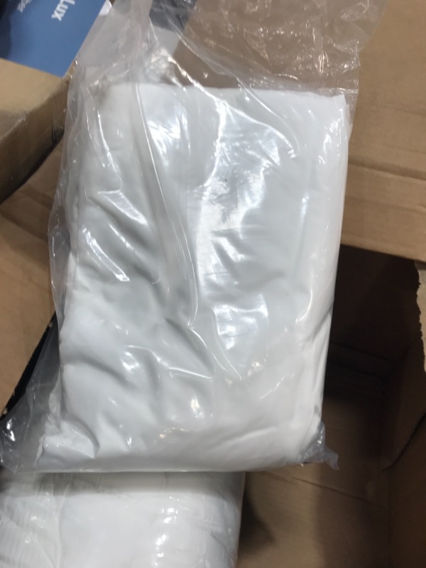 Photo 2 of **1 PILLOW IS OPEN THE 2ND PILLOW IS IN ORIGINAL PACKAGE**
Utopia Bedding Bed Pillows for Sleeping Queen Size, Set of 2, Cooling Hotel Quality, for Back, Stomach or Side Sleepers
