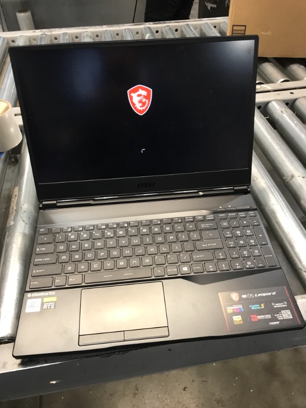 Photo 5 of **USED, NO PAMPHLETS, OR ORIGINAL PACKAGE** BOTTOM OF LAPTOP HAS 12 SCREWS  ATTACHED**
MSI GF65 Gaming Laptop: 15.6" 144Hz FHD 1080p, Intel Core i7-10750H 6 Core, NVIDIA GeForce RTX 3060, 16GB, 512GB NVMe SSD, WiFi 6, Red Keyboard, Win 10, Black (10UE-047