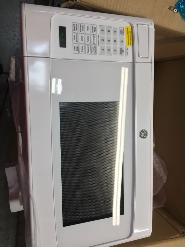 Photo 3 of 1.1 cu. ft. Countertop Microwave in White
