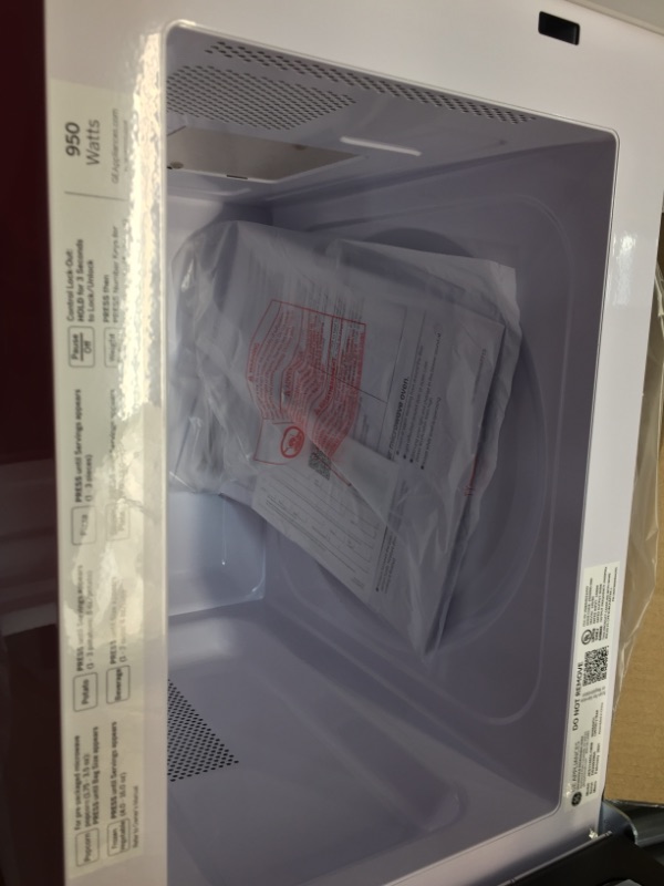 Photo 2 of 1.1 cu. ft. Countertop Microwave in White
