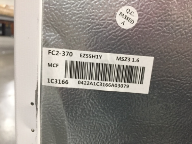 Photo 4 of 10.1 cu. ft. Top Freezer Refrigerator in White
59.4 in X  23.6 in


//nonfunctional//parts only//item powers on, but doesn't get cold// damaged corner