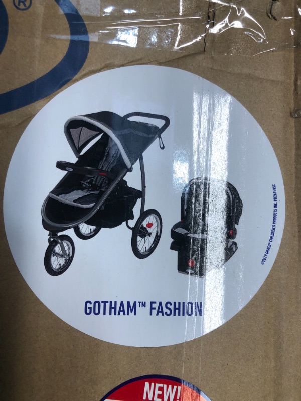 Photo 5 of Graco FastAction Fold Jogger Travel System | Includes the FastAction Fold Jogging Stroller and SnugRide 35 Infant Car Seat, Gotham
