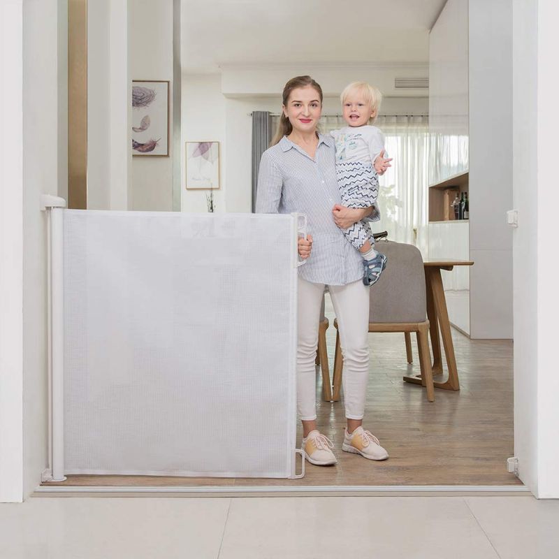 Photo 1 of EasyBaby Products Extra Wide and Extra Tall Indoor Outdoor Retractable Baby Gate Extends up to 71" Wide, 39.3" (100cm) Tall, White
