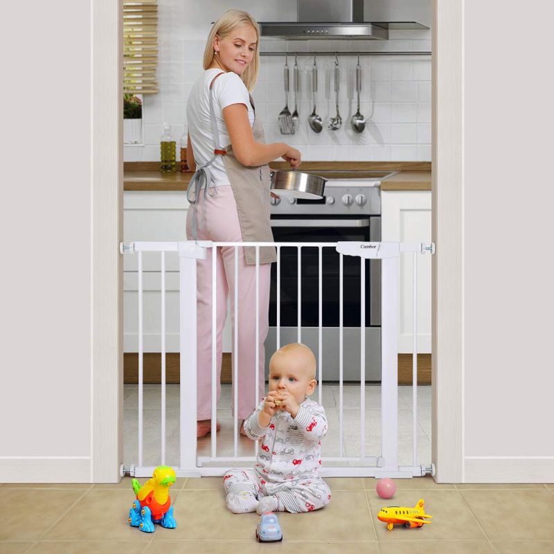 Photo 1 of Cumbor 40.6” Auto Close Safety Baby Gate, Durable Extra Wide Child Gate for Stairs,Doorways, Easy Walk Thru Dog Gate for House. Includes 4 Wall Cups, 2.75-Inch and 5.5-Inch Extension, White
