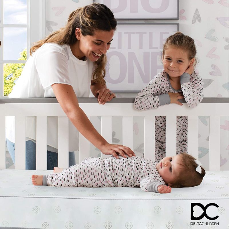 Photo 1 of Delta Children Twinkle Galaxy Dual Sided Crib and Toddler Mattress - Premium Sustainably Sourced Fiber Core - Waterproof - GREENGUARD Gold Certified (Non-Toxic)