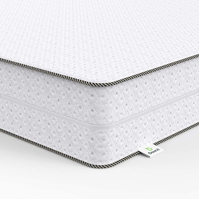 Photo 1 of Dourxi Crib Mattress, Toddler Mattress Dual Sided Comfort Memory Foam Mattress with Removable Breathable Cover and Extra Waterproof Protector, Standard Size Crib Mattress for Infant Baby and Toddler 52 x 27.5 x 5.5 inches

