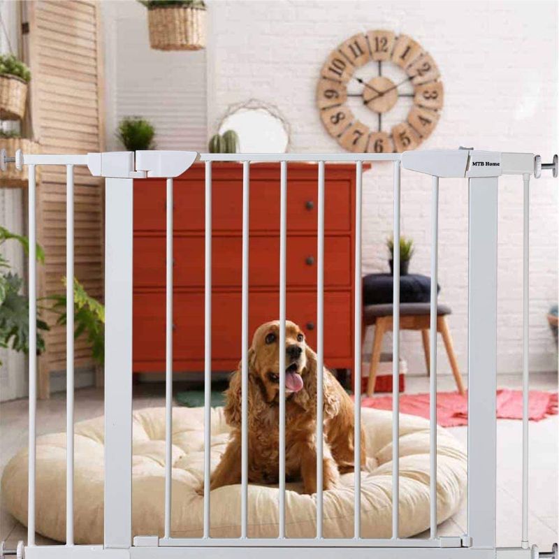Photo 1 of **USED*
MTB Home Walk Thru Pet Gate, Multiple Sizes, Includes Extension Kit, 4 Pack Pressure Mount Kit, 4 Pack Wall Cups and Mounting Kit (1 Gate Set), White
