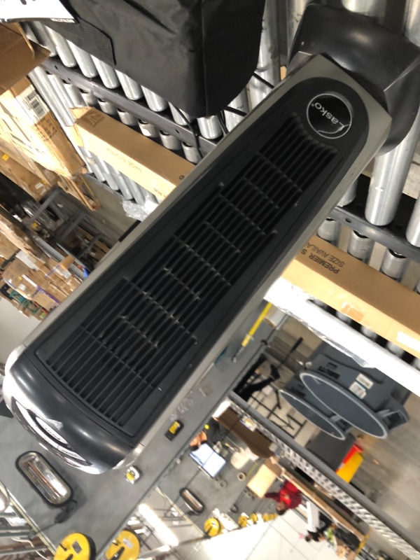 Photo 2 of **USED**
Lasko Lasko-22 Digital Ceramic Oscillating Remote (751320) Tower Heater, 8.5x2033 L x 7.25x2033 W x 23x2033 H, Grey/Black
