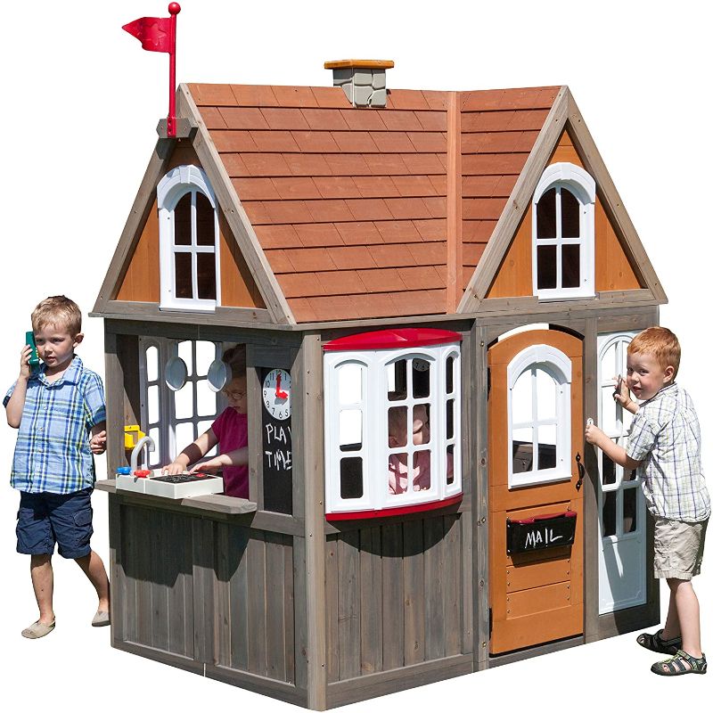 Photo 1 of ** BOX IS OPEN IN SEVERAL PLACE SOME COMPONENTS MAY BE MISSING**
KidKraft Greystone Cottage Wooden Outdoor Playhouse with EZ Kraft Assembly, Ringing Doorbell, Mailbox, Play Kitchen and Chalkboard, Gift for Ages 2-10
