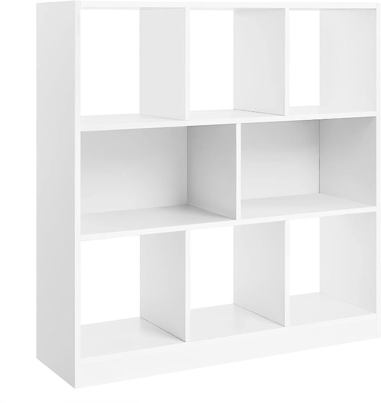 Photo 1 of **NO ASSEMBLY PAMPHLET INCLUDED**
VASAGLE Wooden Bookcase with Open Shelves, Freestanding Bookshelf Storage Unit and Display Cabinet, for Living Room, Study Room, 35.4 x 11 x 39.4 Inches, White ULBC55WT

