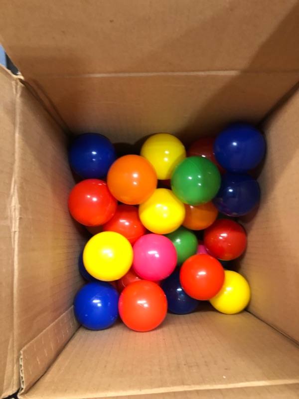 Photo 1 of box full of play pin balls 