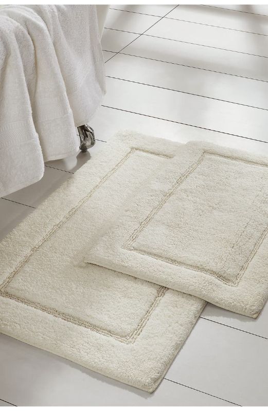 Photo 1 of 2-Piece Solid Loop with Non-Slip Backing Bath Mat Set - White
 Small bath mat: 17" x 24" - Large bath mat: 21" x 34" 