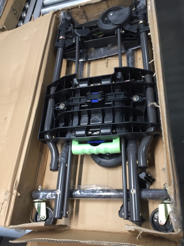 Photo 1 of Cosco 12222PBG1E Shifter 300-Pound Capacity Multi-Position Heavy Duty Folding Dolly, Green hand-trucks 1 wheel is broken
