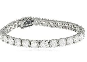 Photo 1 of Platinum or Gold Plated Sterling Silver Round-Cut Tennis Bracelet made with Swarovski Zirconia
6 mm 
missing diamond