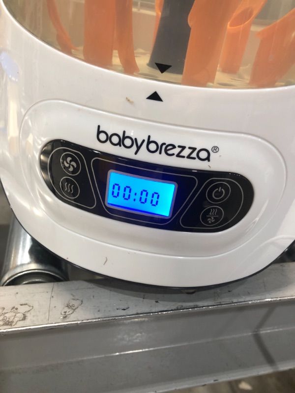 Photo 3 of ***PARTS ONLY*** Baby Brezza Baby Bottle Sterilizer and Dryer Machine – Electric Steam Sterilization - Universal Fit - Pacifiers, Glass, Plastic, and Newborn Feeding Bottles
tested and working 