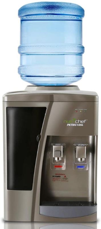 Photo 1 of NO JUG INCLUDED 
Nutrichef Countertop Water Cooler Dispenser - Hot & Cold Water, with Child Safety Lock, Black-Chrome
tested and working 