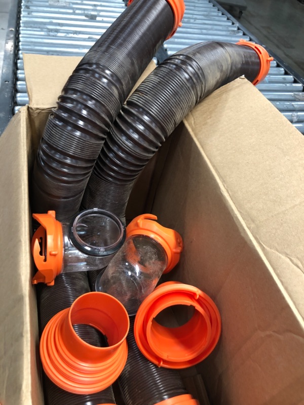 Photo 1 of Camco RhinoFLEX 15ft RV Sewer Hose Kit, Includes Swivel Fitting and Translucent Elbow with 4-In-1 Dump Station Fitting, Storage Caps Included - 39761 , Black
