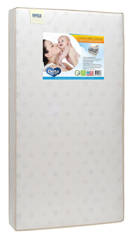 Photo 1 of Delta Children Twinkle Stars Deluxe 2-Stage Premium Innerspring Crib and Toddler Mattress 