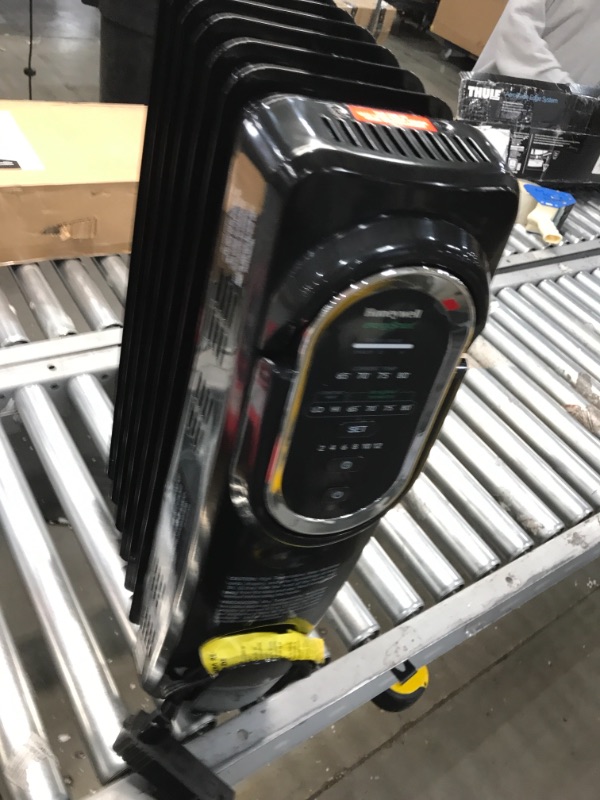 Photo 1 of Honeywell HZ-789 EnergySmart Electric Oil Filled Radiator Whole Room Heater, Black, 24.45"H x 9.06"D x 13.74"W (HZ789)
