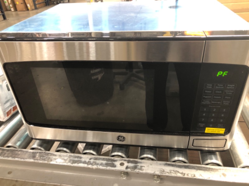 Photo 2 of GE - 1.1 Cu. ft. Mid-Size Microwave - Stainless Steel