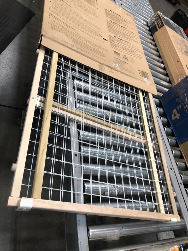 Photo 2 of **USED**
Toddleroo by North States 50" Wide Extra Wide Wire Mesh Baby Gate: Installs in Extra Wide Opening in Seconds Without damaging Wall. Pressure Mount. Fits 29.5"-50" Wide (32" Tall, Sustainable Hardwood)

