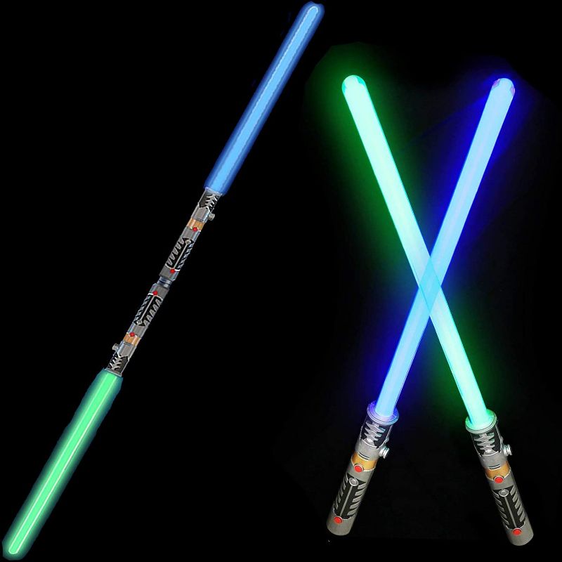 Photo 1 of **USED**
2-in-1 LED Light Up Swords Set FX Double Bladed Dual Sabers with Motion Sensitive Sound Effects (2 Pack)
