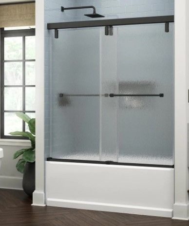 Photo 1 of **USED**COLOR AND STYLE MAY BE DIFFERENT FROM STOCK PHOTO**INCOMPLETE**
Hover Image to Zoom
Everly 60 in. x 59-1/4 in. Frameless Mod Soft-Close Sliding Bathtub Door in Matte Black with 3/8 in. (10 mm) Rain Glass
by
Delta
