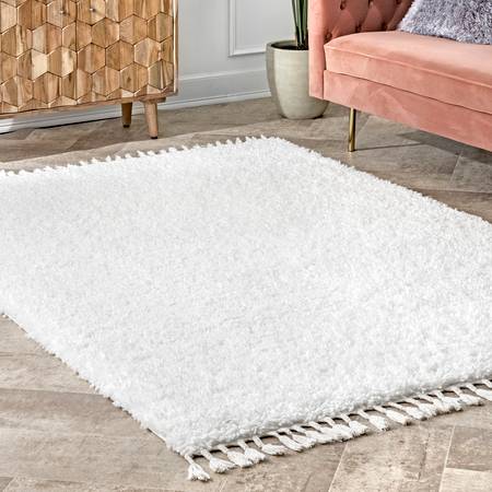 Photo 1 of **MINOR STAINS FROM SHIPPING**
Ivory Solid Shag With Tassels Area Rug
