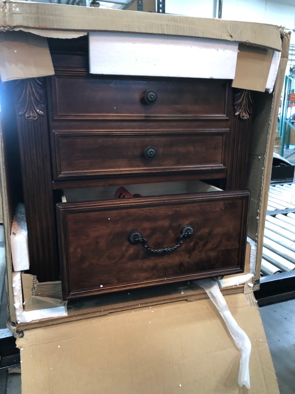 Photo 2 of 
MINOR DAMAGE**Leahlyn B526-92 25" 2-Drawer Nightstand with Ornate Bail and Knob Handles Fluted Pilasters and Leaf Form Corbels in Warm
Dimensions: 21.00 in (L) x 29.38 in (W) x 28.25 in (H)
