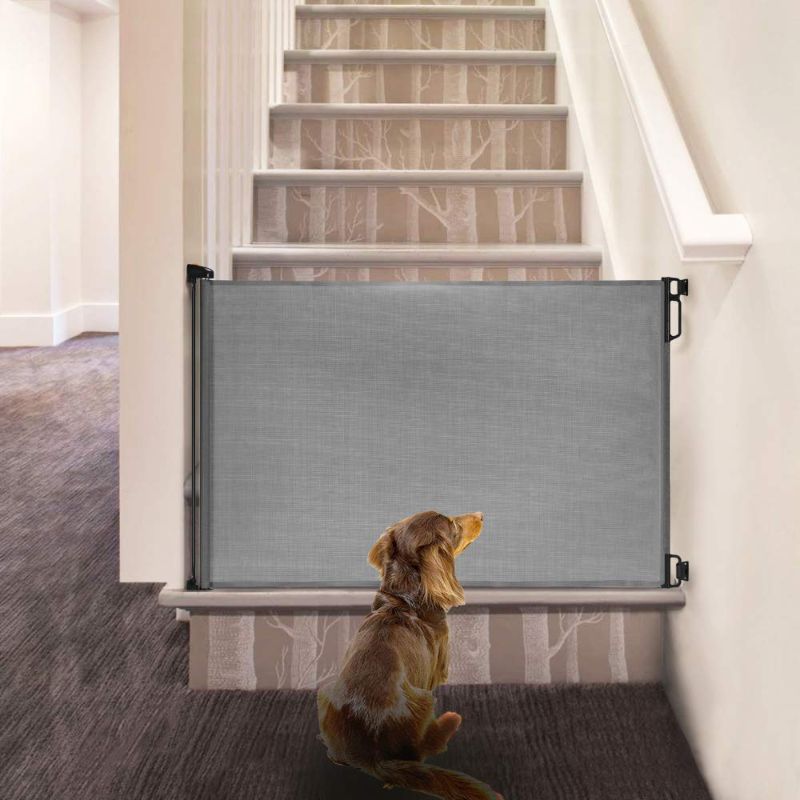 Photo 1 of EasyBaby Products Extra Wide Indoor Outdoor Retractable Baby Gate, 33" Tall, Extends up to 71" Wide, Grey
