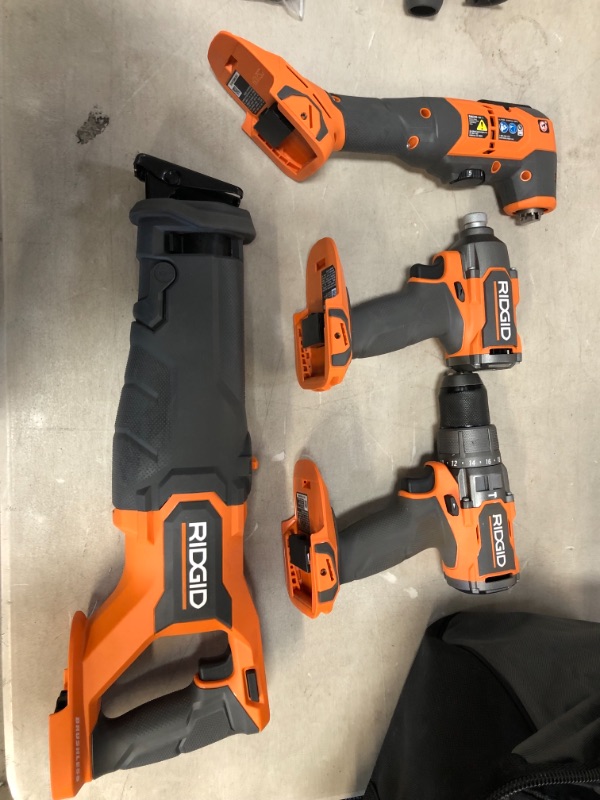 Photo 10 of 18V Brushless Cordless 4-Tool Combo Kit with (1) 4.0 Ah and (1) 2.0 Ah MAX Output Batteries, 18V Charger, and Tool Bag
AS IS PREVIOUSLY USED, MISSING ACCESSORIES (BLADES), MISSING CHARGER, PLEASE SEE PHOTOS 