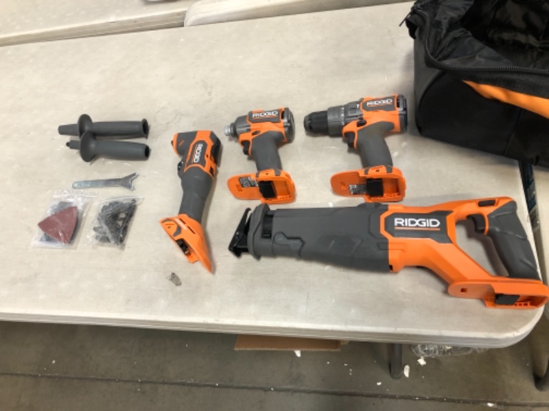 Photo 4 of 18V Brushless Cordless 4-Tool Combo Kit with (1) 4.0 Ah and (1) 2.0 Ah MAX Output Batteries, 18V Charger, and Tool Bag
AS IS PREVIOUSLY USED, MISSING ACCESSORIES (BLADES), MISSING CHARGER, PLEASE SEE PHOTOS 