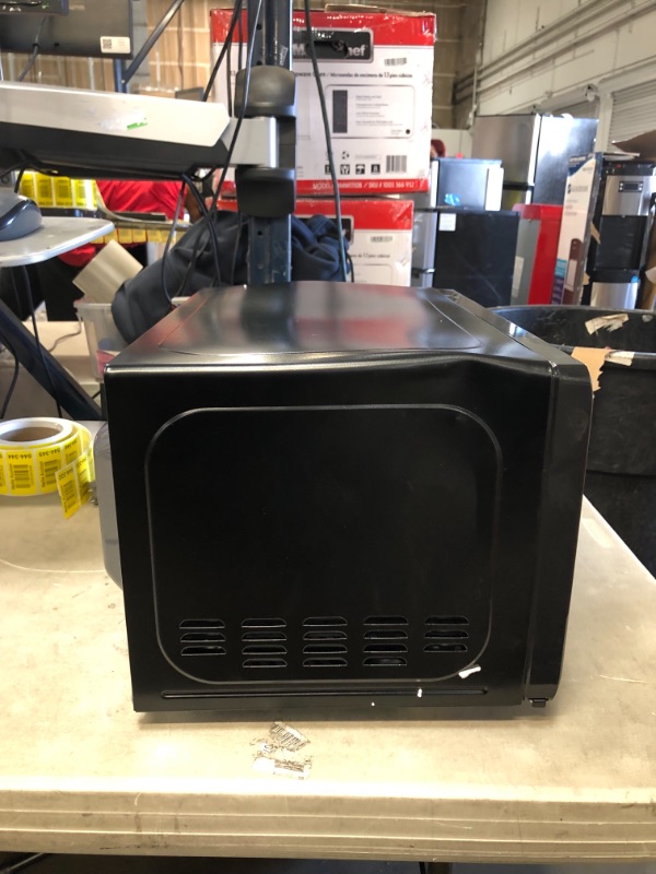 Photo 4 of 0.7 cu. ft. Countertop Microwave in Black with Gray Cavity
PREVIOUSLY OPENED, DAMAGED FROM SHIPPING, PLEASE SEE PHOTOS 