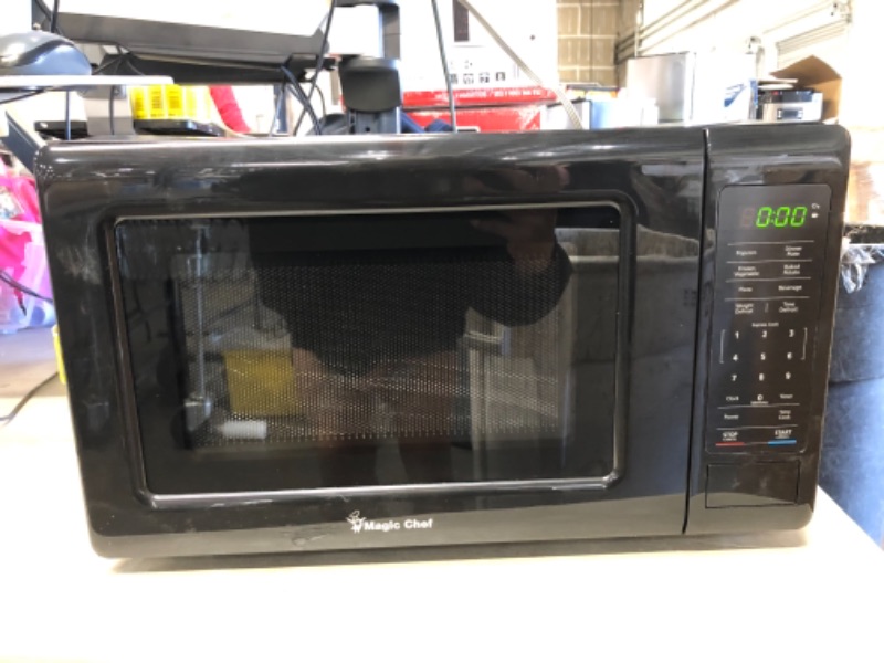 Photo 2 of 0.7 cu. ft. Countertop Microwave in Black with Gray Cavity
PREVIOUSLY OPENED, DAMAGED FROM SHIPPING, PLEASE SEE PHOTOS 