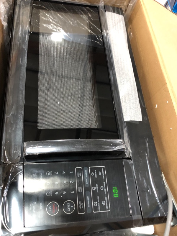 Photo 1 of 1.6 cu. ft. Over the Range Microwave in Black
