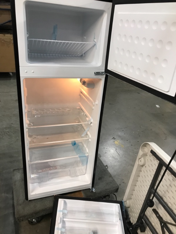 Photo 1 of RCA RFR786-BLACK 2 Door Apartment Size Refrigerator with Freezer, 7.5 cu. ft, Retro Black
BROKEN DOOR.